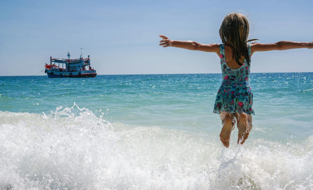 Girl enjoying the beach.