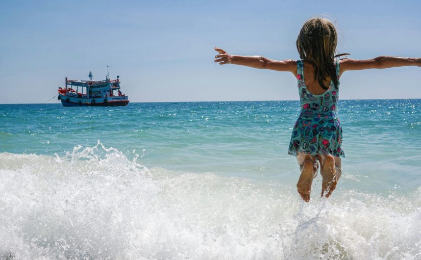 Girl enjoying the beach.
