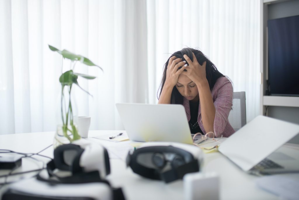 Woman sleeping at her desk